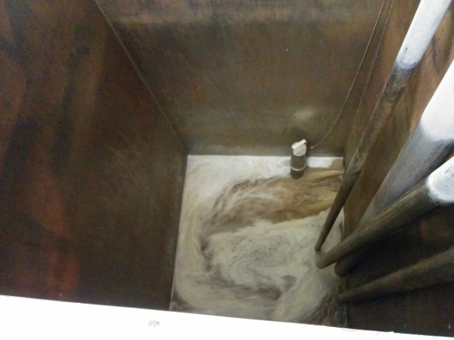 The wort being transferred into the underback before being redistributed to the washbacks.