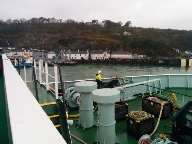 The ferry docking at Port Askaig.